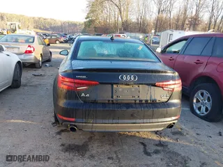 2017 Audi A4 Premium with VIN WAUANAF47HN039038, listed as a IAAI auction lot 41439609 with 121,410 mi miles. Bid and sale history available at carsss.com. Image 16.