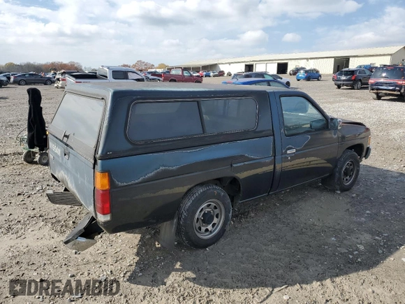 1994 Nissan Frontier with VIN 1N6SD11S4RC405080, listed as a Copart auction lot 82565904 with 154,400 mi miles and Salvage title. Bid and sale history available at DreamBid. Image 3.