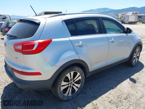 2012 Kia Sportage EX with VIN KNDPCCA24C7255785, listed as a IAAI auction lot 42620042 with 139,936 mi miles and . Bid and sale history available at DreamBid. Image 4.