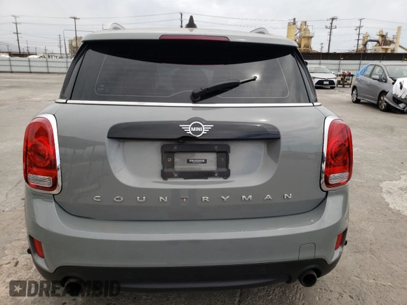 2019 MINI Countryman Cooper S with VIN WMZYT3C56K3E97143, listed as a Copart auction lot 62315533 with 0 mi miles and Salvage Title. Bid and sale history available at carsss.com. Image 6.