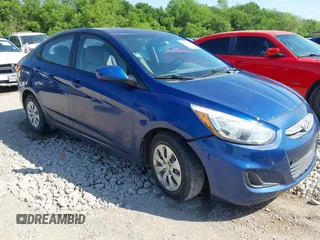2016 Hyundai Accent SE with VIN KMHCT4AE0GU031186, listed as a IAAI auction lot 42027511 with 128,583 mi miles. Bid and sale history available at carsss.com. Image 1.