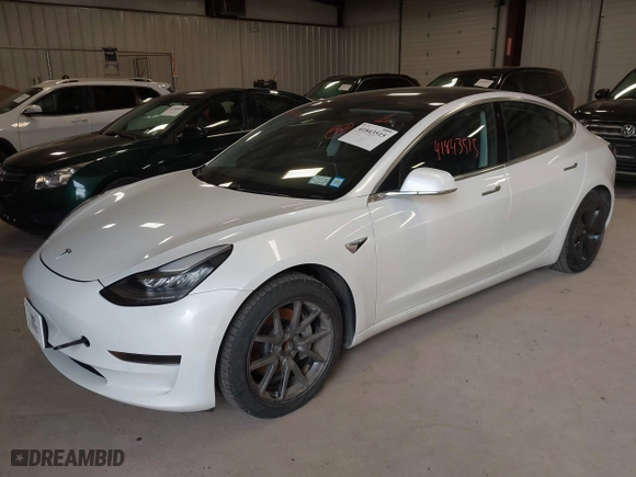 2020 Tesla Model 3 Standard Range Plus with VIN 5YJ3E1EA4LF802207, listed as a IAAI auction lot 41843515 with 67,156 mi miles. Bid and sale history available at carsss.com. Image 20.