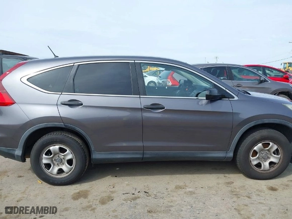 2015 Honda CR-V LX with VIN 3CZRM3H32FG702573, listed as a IAAI auction lot 41824116 with 266,847 mi miles. Bid and sale history available at carsss.com. Image 13.