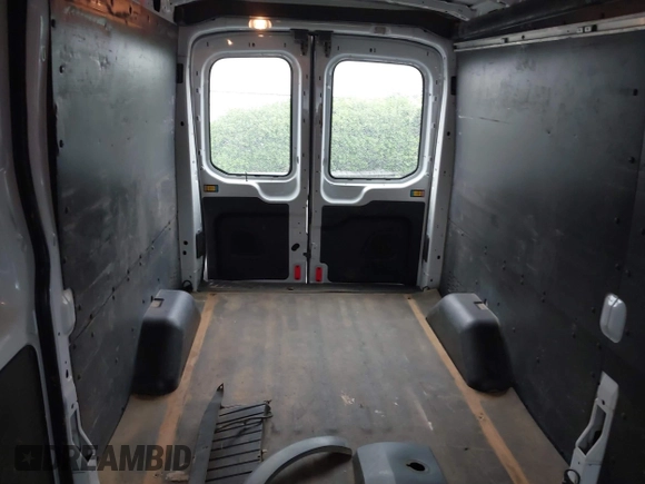 2015 Ford Transit Cargo with VIN 1FTNR2CM4FKA26975, listed as a IAAI auction lot 39407096 with 150,786 mi miles and . Bid and sale history available at carsss.com. Image 8.