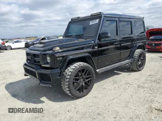 2002 Mercedes-Benz G 500 with VIN WDCYR49E12X133935, listed as a Copart auction lot 53904205 with 196,897 mi miles and Salvage Title. Bid and sale history available at DreamBid. Image 1.