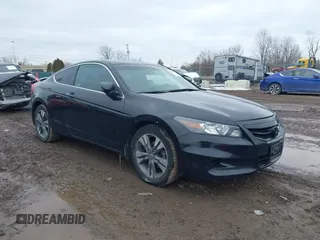 2011 Honda Accord EX with VIN 1HGCS1B70BA013174, listed as a IAAI auction lot 41604372 with 169,498 mi miles and . Bid and sale history available at DreamBid. Image 1.