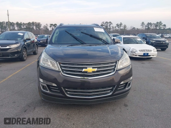 2015 Chevrolet Traverse LTZ with VIN 1GNKVJKDXFJ206159, listed as a IAAI auction lot 41762515 with 143,062 mi miles and . Bid and sale history available at DreamBid. Image 12.