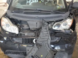 2015 Smart fortwo Passion с VIN WMEEJ3BA6FK820446, выставлен на аукционе Copart как лот 63243635 с пробегом Не указан миль и Списание • Salvage title. История ставок и продаж доступна на DreamBid. Изображение 11.