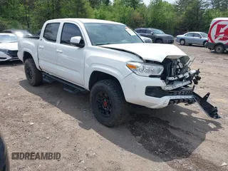 2021 Toyota Tacoma 4WD SR with VIN 3TMCZ5AN2MM414975, listed as a IAAI auction lot 41997227 with 57,729 mi miles. Bid and sale history available at carsss.com. Image 1.