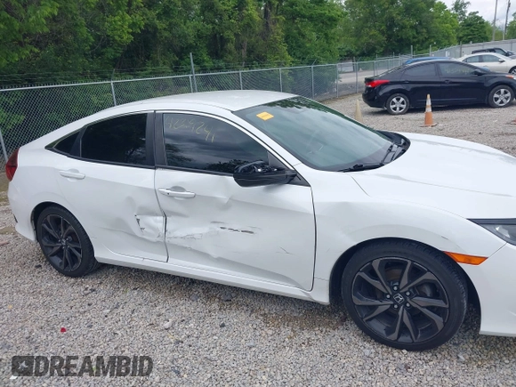 2019 Honda Civic Sport with VIN 19XFC2F85KE019311, listed as a IAAI auction lot 42319241 with 163,241 mi miles and . Bid and sale history available at DreamBid. Image 6.