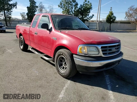 2000 Ford F-150 XL with VIN 1FTZX1721YNA67771, listed as a Copart auction lot 41439795 with 0 mi miles and Salvage Title. Bid and sale history available at carsss.com. Image 10.