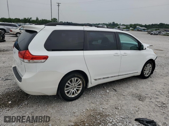 2012 Toyota Sienna XLE AAS с VIN 5TDYK3DC7CS207716, выставлен на аукционе Copart как лот 60592265 с пробегом 287 021 миль миль и Списание • Salvage title. История ставок и продаж доступна на DreamBid. Изображение 3.