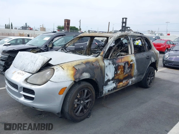 2005 Porsche Cayenne S z VIN WP1AB29P55LA60953, wystawiony jako IAAI lot #41678718 z przebiegiem Nie podano mil oraz . Historia ofert i sprzedaży dostępna na DreamBid. Obrazek 2.