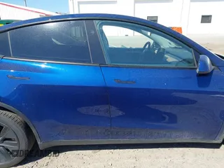 2024 Tesla Model Y Long Range with VIN 7SAYGDEE5RA329172, listed as a IAAI auction lot 41892147 with 8,030 mi miles and . Bid and sale history available at DreamBid. Image 13.