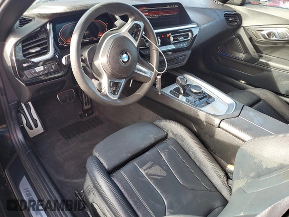 2020 BMW Z4 sDrive30i with VIN WBAHF3C06LWW75400, listed as a Copart auction lot 74297024 with 34,559 mi miles and Salvage Title. Bid and sale history available at carsss.com. Image 8.