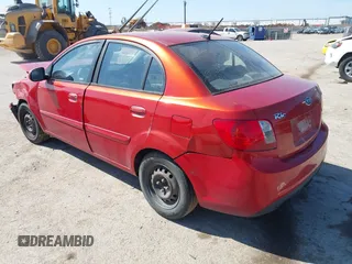 2011 Kia Rio LX with VIN KNADH4A34B6848891, listed as a IAAI auction lot 41678155 with 152,021 mi miles. Bid and sale history available at carsss.com. Image 3.
