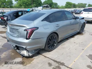 2023 Cadillac CT5 Sport z VIN 1G6DP5RK7P0113696, wystawiony jako IAAI lot #41904906 z przebiegiem 89 191 mil mil oraz . Historia ofert i sprzedaży dostępna na DreamBid. Obrazek 4.