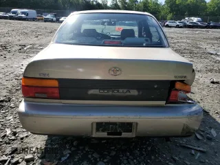 1995 Toyota Corolla DX with VIN 2T1AE09B0SC098739, listed as a Copart auction lot 57653205 with 154,226 mi miles and Salvage title. Bid and sale history available at DreamBid. Image 6.