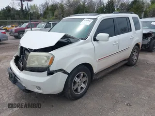 2009 Honda Pilot Touring with VIN 5FNYF48929B032510, listed as a IAAI auction lot 41945923 with 236,256 mi miles and . Bid and sale history available at carsss.com. Image 18.
