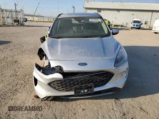 2020 Ford Escape Titanium Hybrid z VIN 1FMCU9DZ4LUC34827, wystawiony jako Copart lot #48769685 z przebiegiem 84 218 mil mil oraz Szkoda całkowita • Salvage title. Historia ofert i sprzedaży dostępna na DreamBid. Obrazek 5.