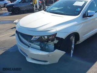 2014 Chevrolet Impala LTZ with VIN 2G1155S32E9206212, listed as a IAAI auction lot 40686005 with 76,750 mi miles. Bid and sale history available at carsss.com. Image 6.