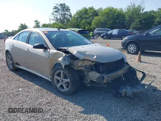 2009 Pontiac G6 1SB with VIN 1G2ZJ57K594265578, listed as a IAAI auction lot 42474086 with 287,429 mi miles and . Bid and sale history available at DreamBid. Image 1.