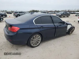 2012 BMW 3 Series 328i with VIN WBA3A5C57CF341019, listed as a Copart auction lot 88589685 with 107,295 mi miles and Salvage Title. Bid and sale history available at DreamBid. Image 3.