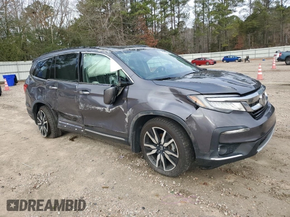 2020 Honda Pilot Touring 8-Passenger with VIN 5FNYF5H91LB004386, listed as a Copart auction lot 85913984 with 54,692 mi miles and Salvage Title. Bid and sale history available at DreamBid. Image 4.