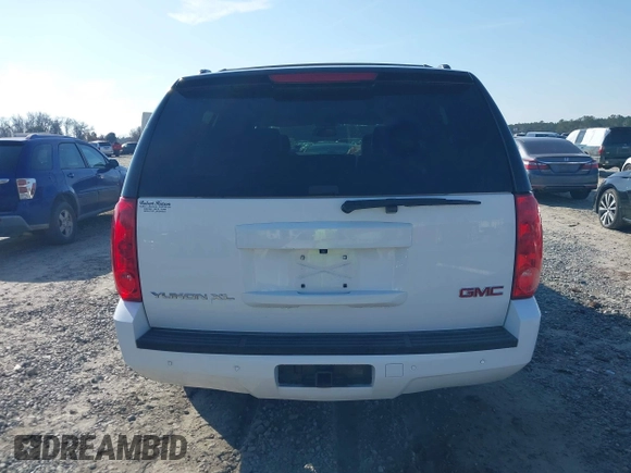 2014 GMC Yukon XL SLT with VIN 1GKS1KE09ER116590, listed as a IAAI auction lot 41459319 with 246,958 mi miles. Bid and sale history available at carsss.com. Image 16.