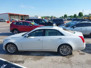2015 Cadillac CTS Luxury AWD z VIN 1G6AX5SX9F0107244, wystawiony jako IAAI lot #42386444 z przebiegiem 171 413 mil mil oraz . Historia ofert i sprzedaży dostępna na DreamBid. Obrazek 14.