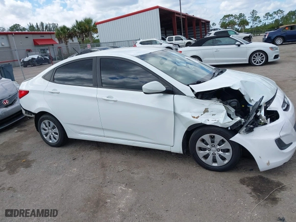 2015 Hyundai Accent GLS with VIN KMHCT4AE9FU808981, listed as a IAAI auction lot 41930246 with 160,406 mi miles. Bid and sale history available at carsss.com. Image 6.