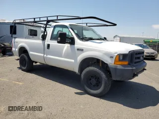 1999 Ford F-250 XL with VIN 1FTNF21L2XEE17853, listed as a Copart auction lot 58869285 with 140,220 mi miles and Clean title. Bid and sale history available at DreamBid. Image 4.