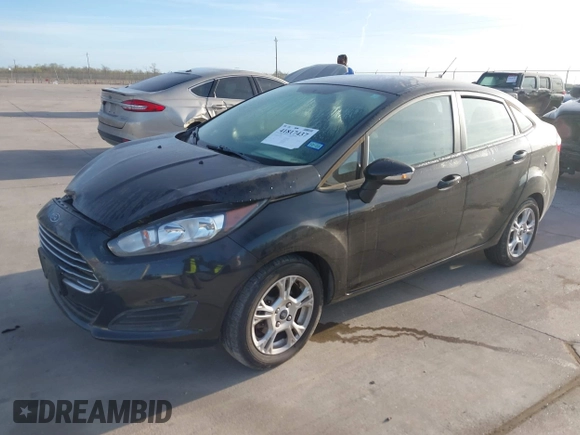 2014 Ford Fiesta SE with VIN 3FADP4BJ0EM139467, listed as a IAAI auction lot 41817437 with 45,570 mi miles and . Bid and sale history available at DreamBid. Image 2.