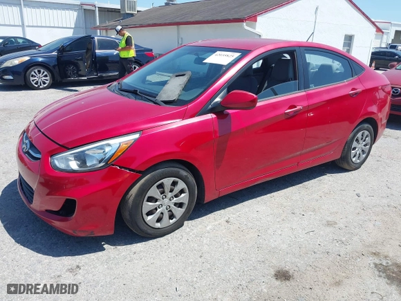 2015 Hyundai Accent GLS with VIN KMHCT4AE1FU801913, listed as a IAAI auction lot 42035825 with 104,701 mi miles. Bid and sale history available at carsss.com. Image 2.