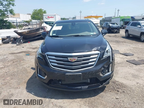 2018 Cadillac XT5 Luxury AWD z VIN 1GYKNDRS0JZ139185, wystawiony jako IAAI lot #42551426 z przebiegiem 109 699 mil mil oraz . Historia ofert i sprzedaży dostępna na DreamBid. Obrazek 12.
