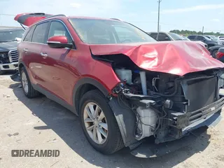2017 Kia Sorento LX z VIN 5XYPG4A54HG215334, wystawiony jako IAAI lot #42279701 z przebiegiem 144 396 mil mil oraz . Historia ofert i sprzedaży dostępna na DreamBid. Obrazek 1.