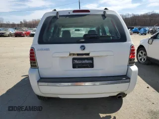 2005 Mercury Mariner Convenience с VIN 4M2YU56Z65DJ16579, выставлен на аукционе Copart как лот 48474465 с пробегом Не указан миль и На запчасти • Non repairable. История ставок и продаж доступна на DreamBid. Изображение 6.