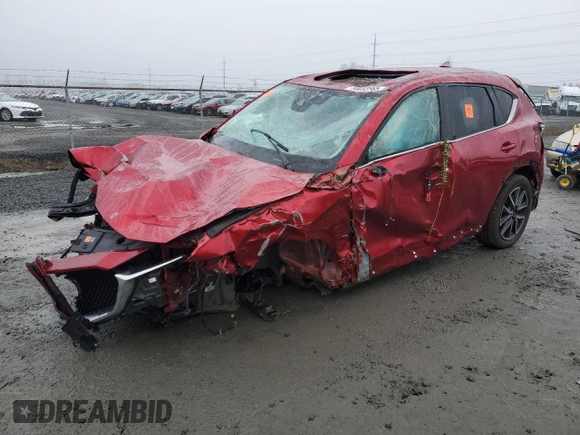 2018 Mazda CX-5 Grand Touring with VIN JM3KFBDM2J0432713, listed as a Copart auction lot 88693565 with 0 mi miles and Salvage Title. Bid and sale history available at carsss.com. Image 1.