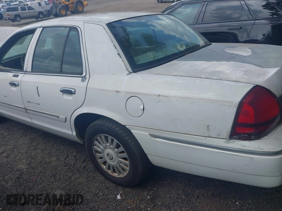 2008 Mercury Grand Marquis LS with VIN 2MEFM75VX8X600015, listed as a IAAI auction lot 42142359 with 310,481 mi miles and . Bid and sale history available at DreamBid. Image 12.
