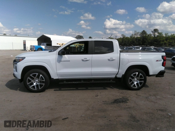 2023 Chevrolet Colorado 4WD Z71 with VIN 1GCPTDEK4P1249624, listed as a IAAI auction lot 42130950 with 9,795 mi miles and . Bid and sale history available at DreamBid. Image 14.