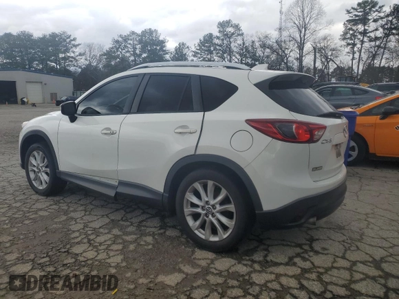 2015 Mazda CX-5 Grand Touring with VIN JM3KE2DY6F0504784, listed as a Copart auction lot 47671705 with 174,682 mi miles and Salvage Title. Bid and sale history available at carsss.com. Image 2.