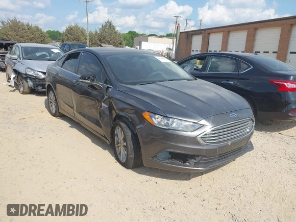 2017 Ford Fusion SE z VIN 3FA6P0H71HR410878, wystawiony jako IAAI lot #42135622 z przebiegiem 99 462 mil mil oraz . Historia ofert i sprzedaży dostępna na DreamBid. Obrazek 1.