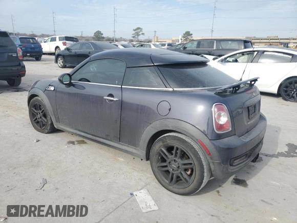 2014 MINI Coupe S z VIN WMWSX3C59ET773064, wystawiony jako Copart lot #42989015 z przebiegiem 135 005 mil mil oraz Szkoda całkowita • Salvage title. Historia ofert i sprzedaży dostępna na DreamBid. Obrazek 2.