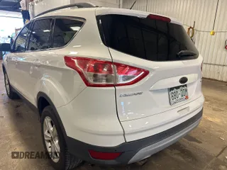 2014 Ford Escape SE with VIN 1FMCU9G94EUD80272, listed as a IAAI auction lot 42737727 with 138,226 mi miles and . Bid and sale history available at DreamBid. Image 18.