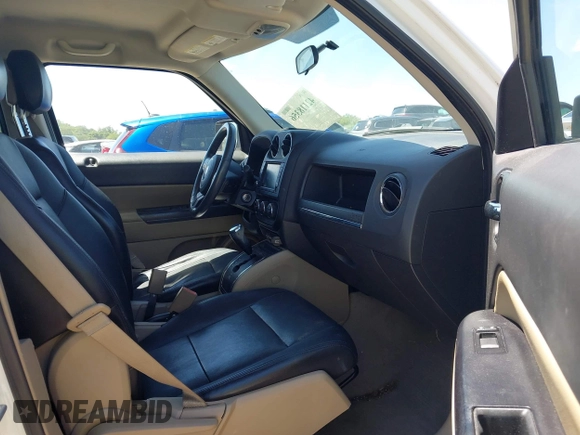 2014 Jeep Patriot Latitude z VIN 1C4NJPFB1ED505288, wystawiony jako IAAI lot #42118356 z przebiegiem 146 615 mil mil oraz . Historia ofert i sprzedaży dostępna na DreamBid. Obrazek 5.