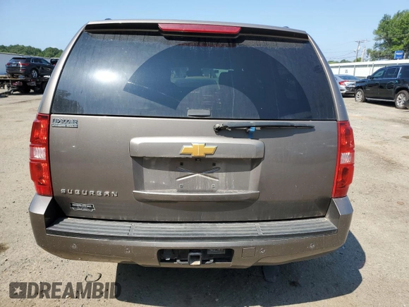 2013 Chevrolet Suburban LT with VIN 1GNSCJE07DR104489, listed as a Copart auction lot 60844784 with 185,420 mi miles and Salvage Title. Bid and sale history available at carsss.com. Image 6.