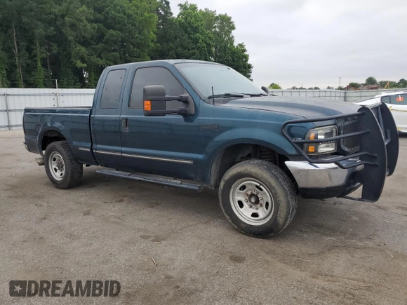1999 Ford F-250 XL with VIN 1FTNX20FXXEA40858, listed as a Copart auction lot 63296925 with 368,565 mi miles and Salvage title. Bid and sale history available at DreamBid. Image 4.