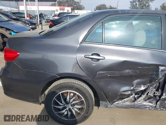 2011 Toyota Corolla L with VIN JTDBU4EE3BJ090749, listed as a IAAI auction lot 42106633 with 209,824 mi miles. Bid and sale history available at carsss.com. Image 19.