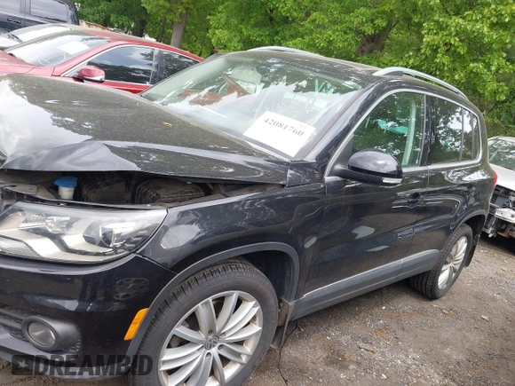 2016 Volkswagen Tiguan S with VIN WVGBV7AX6GW542656, listed as a IAAI auction lot 42081760 with 85,200 mi miles and . Bid and sale history available at DreamBid. Image 13.