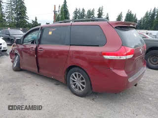 2011 Toyota Sienna XLE AAS with VIN 5TDYK3DC0BS093590, listed as a IAAI auction lot 42714201 with 155,699 mi miles and . Bid and sale history available at DreamBid. Image 3.